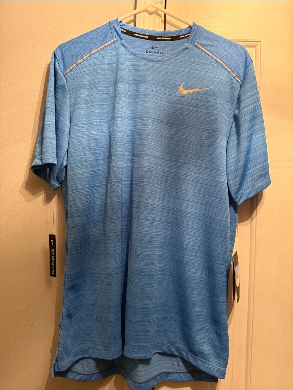Nike Men's Short Sleeve Dri-FIT Tee in Blue with White Swoosh